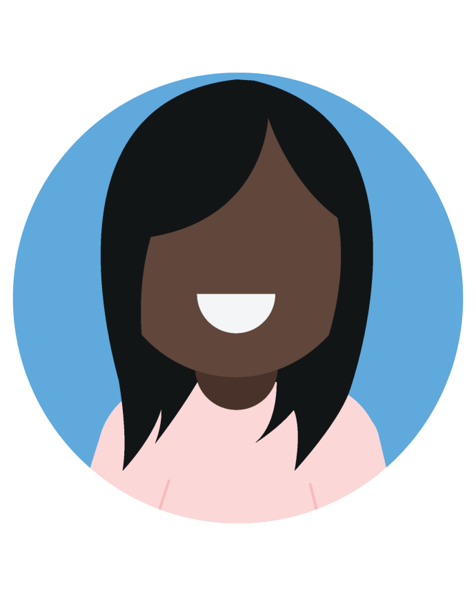 Nicola is black, has medium length dark hair and is wearing a pink top.